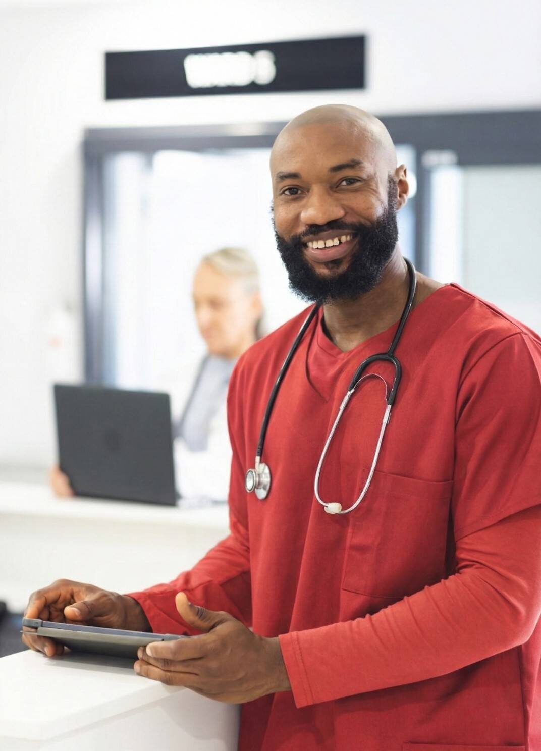 Healthcare professional welcoming patients at a clinic